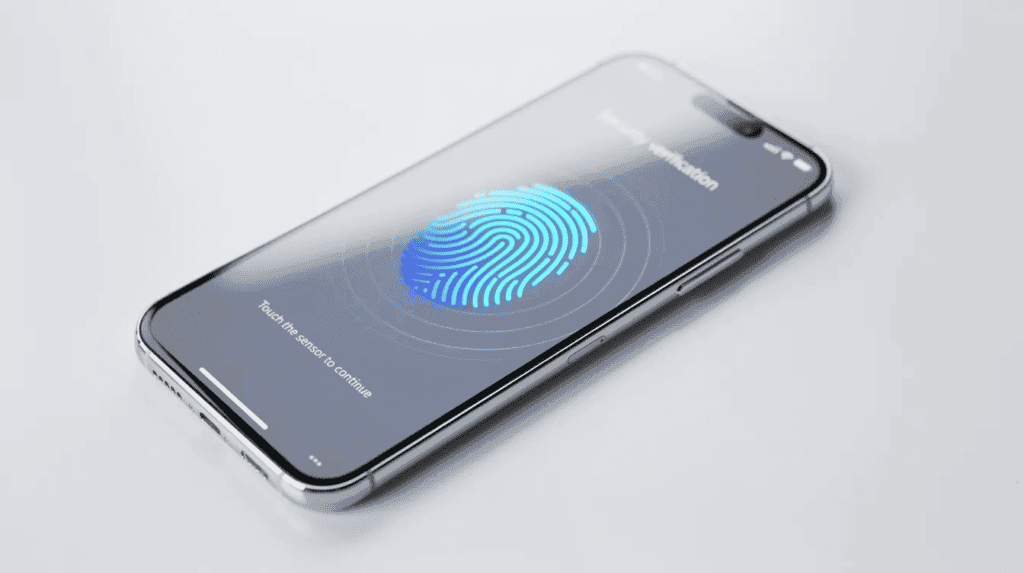 A modern smartphone displays a security verification screen featuring a fingerprint icon, indicating the need for biometric authentication. This image highlights the importance of secure access to financial products, such as investment accounts and brokerage accounts, in today's digital investing landscape.